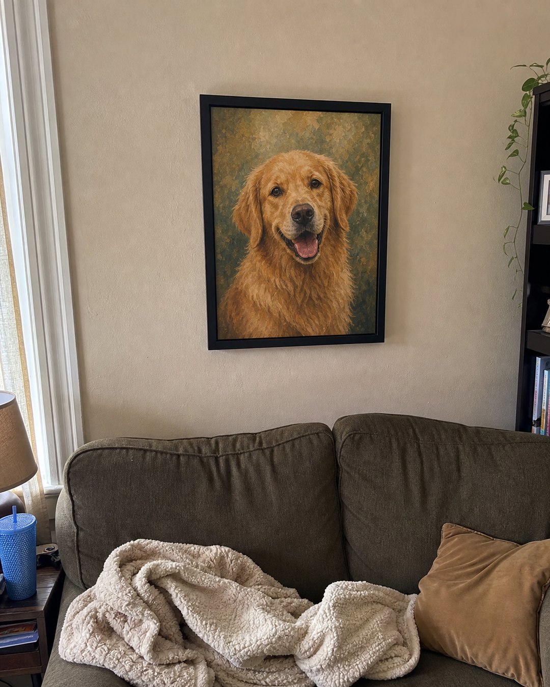 Styled example of a golden retriever portrait displayed above a living room sofa